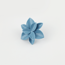 Load image into Gallery viewer, Contemporary ceramics artisanal work. Nature-inspired jewelry. Impressive artisanal work. Blue flower ring on a bright background.