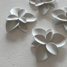 Load image into Gallery viewer, Kiln layer close-up: nature-inspired design. Porcelain flowers mimicking the flora.