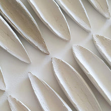Load image into Gallery viewer, Raw porcelain pieces drying for days before being polished. Natural and beautiful light. 