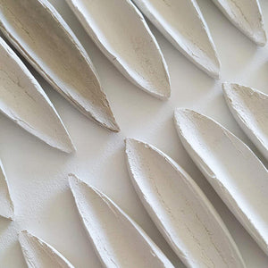 Raw porcelain pieces drying for days before being polished. Natural and beautiful light. 