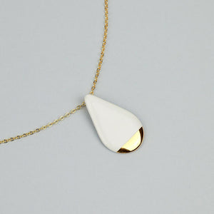 Delicate white and gold porcelain necklace. Delightful jewellery piece.