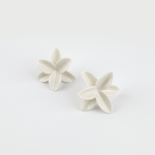 Load image into Gallery viewer, A pair of elegant white porcelain flower earrings, featuring intricate petal details and a delicate design.
