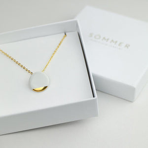 White and gold packaging. Foil logo. Elegant jewellery box.
