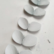 Load image into Gallery viewer, Blue clay sculpture to wear. On-of-a-kind earrings in the making. 