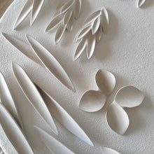 Load image into Gallery viewer, Full kiln layer. Nature-inspired raw porcelain pieces ready to be fired. 