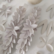 Load image into Gallery viewer, Raw porcelain headpieces close-up. Floral and minimal design. 