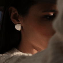 Load image into Gallery viewer, Close-up of a model wearing delicate porcelain earrings. 